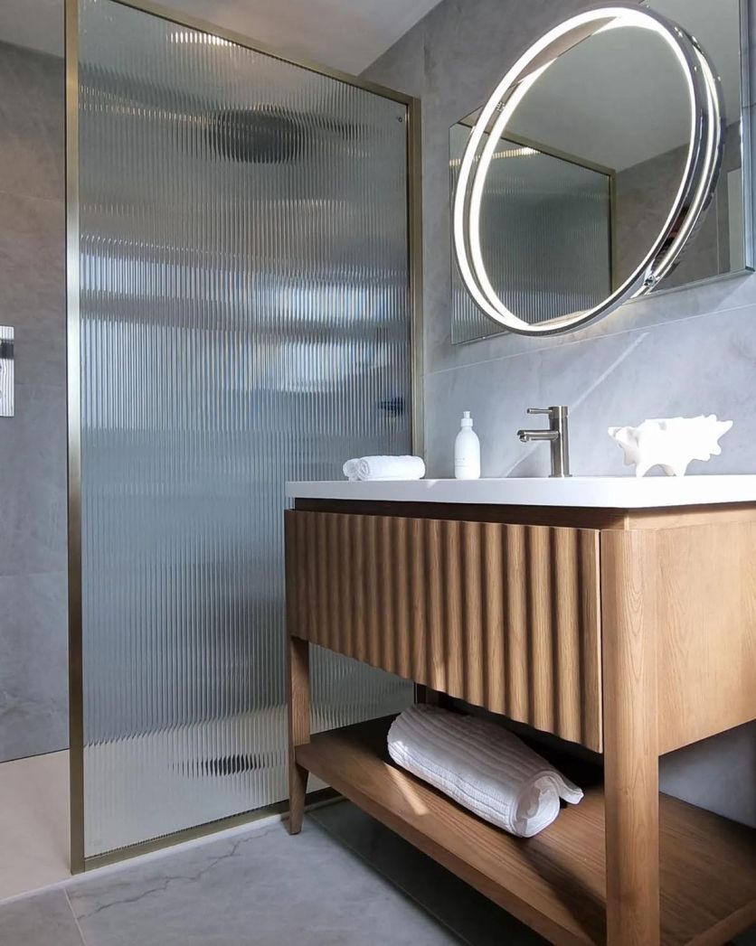 Amien Brushed Gold Framed Fluted Glass Shower Screen - 980mm