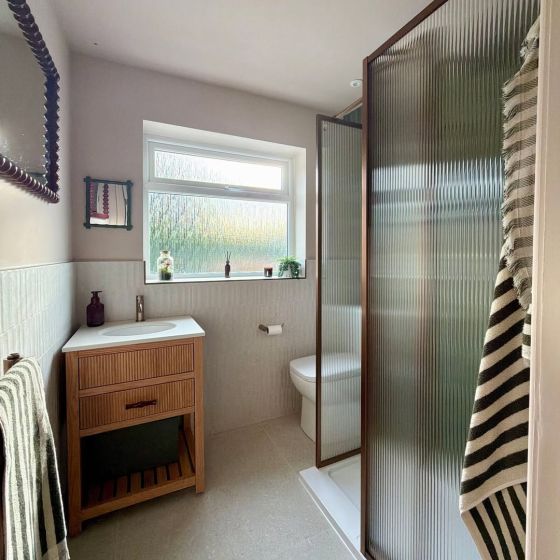 Amien Brushed Bronze Fluted Glass Shower Screen 980mm