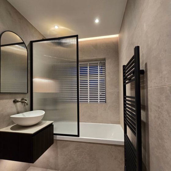 Amien Matt Black Framed Fluted Glass Bath Screen