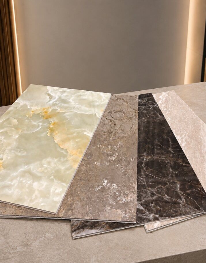 Variety of PVC bathroom wall panels in marble and stone effects