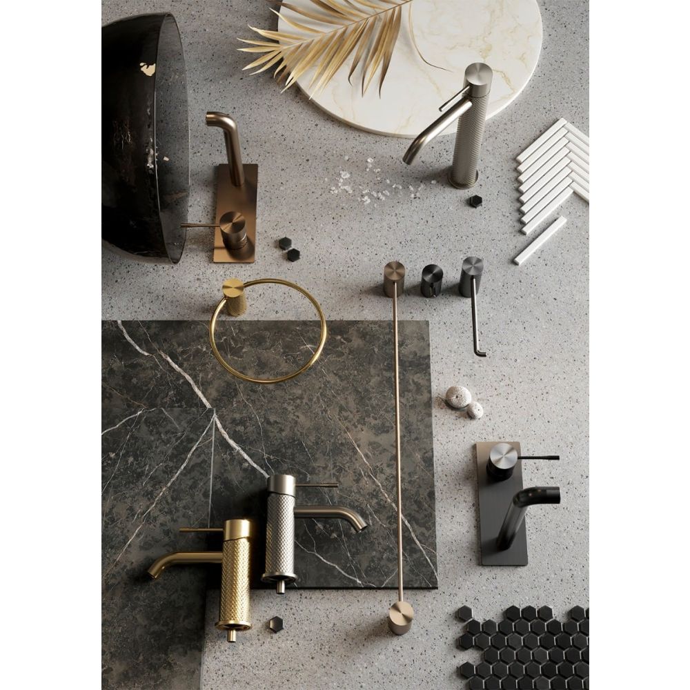 Moray Brushed Gold single lever basin mixer tap featuring a textured knurled detailing - Moodboard Display