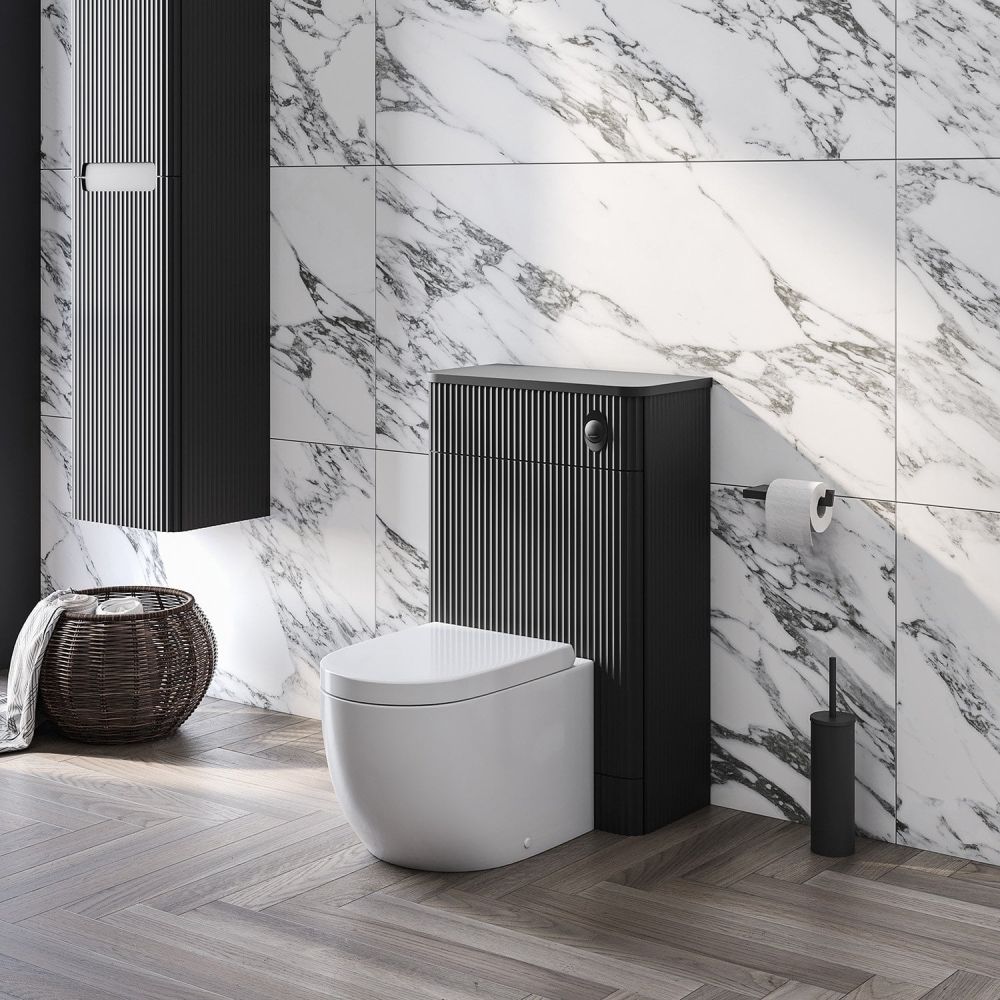 white marble roomset showcasing the Soar Ribbed Black WC Unit
