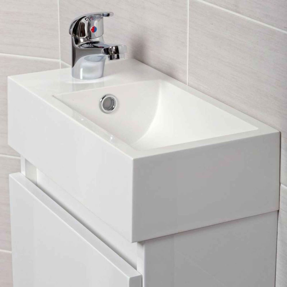 Close up view of the corner of the resin basin on the Compact Gloss White Wall Hung Cloakroom Vanity Unit