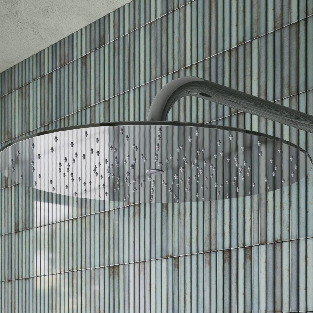 Aqualisa S3 Chrome Wall Fixed Shower Head detailed view upon a teal tiled background