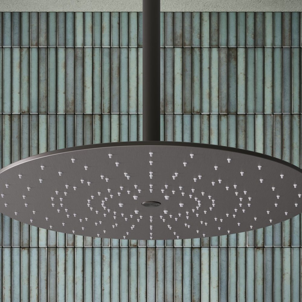 Aqualisa S3 gunmetal shower head on an aqua tiled background