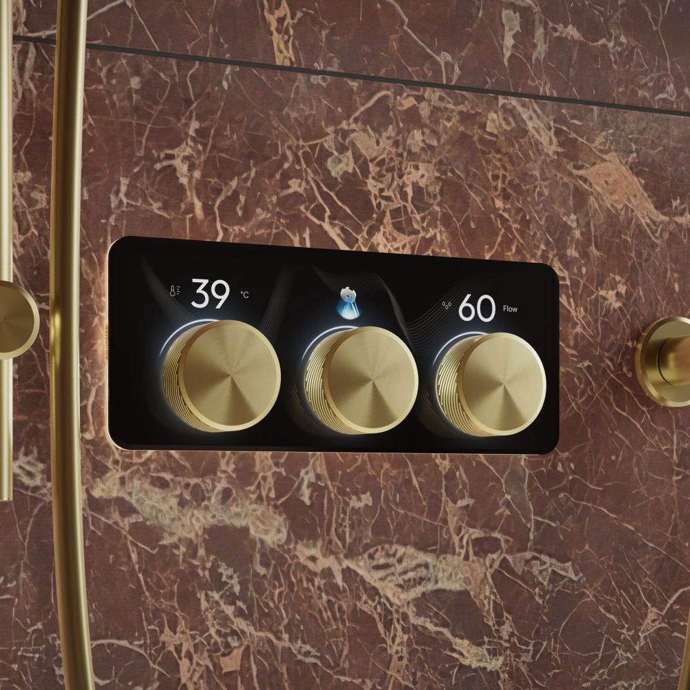 Aqualisa S3 Gold Horizontal Controls detailed view upon a stone brown tiled background