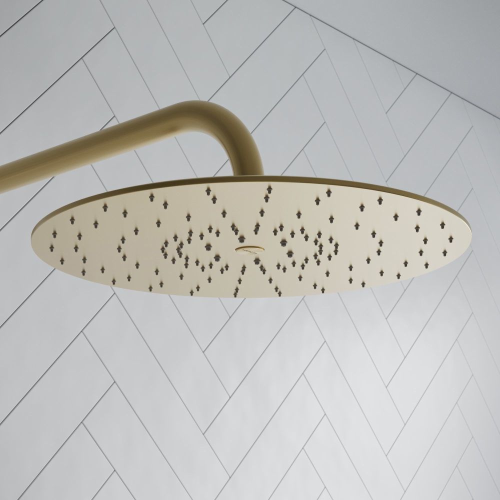 Aqualisa S3 Gold Wall Fixed Shower Head detailed view upon a white tiled background