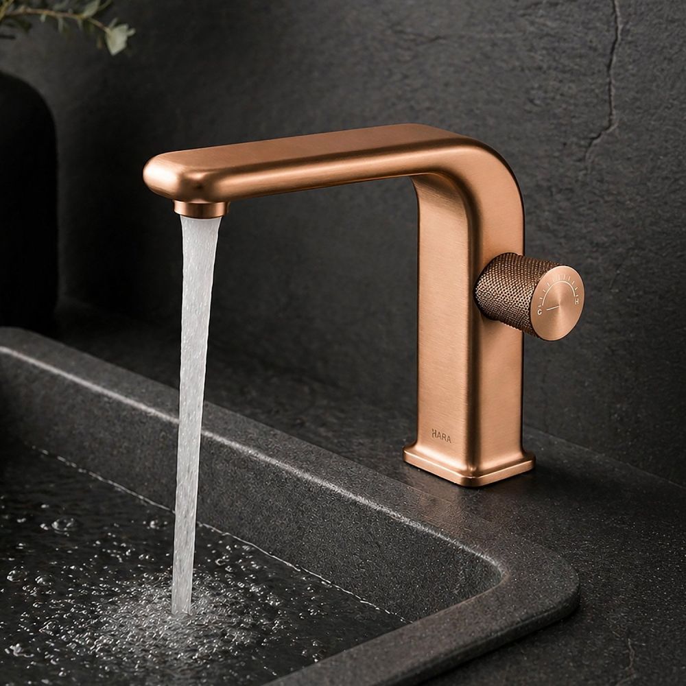 Detailed view showing the Manisa Brushed Bronze Basin Mono Tap running water