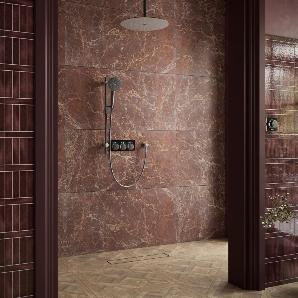 Aqualisa S3 Matt Black Shower Pack on a brown tiled background