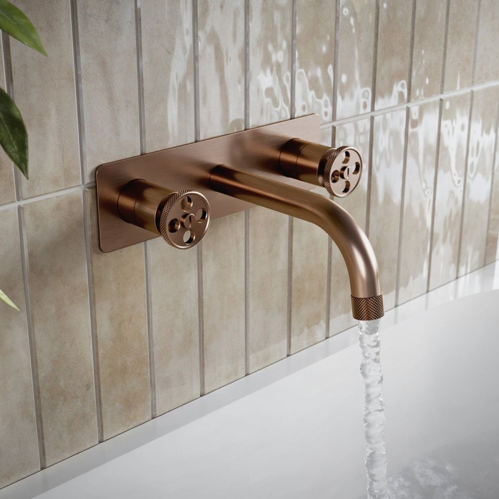 Industrial style bathroom featuring the Urban Brushed Bronze Wall Mounted Bath Tap