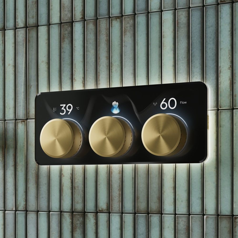 Aqualisa S3 Gold Horizontal Controls detailed view upon a teal tiled background