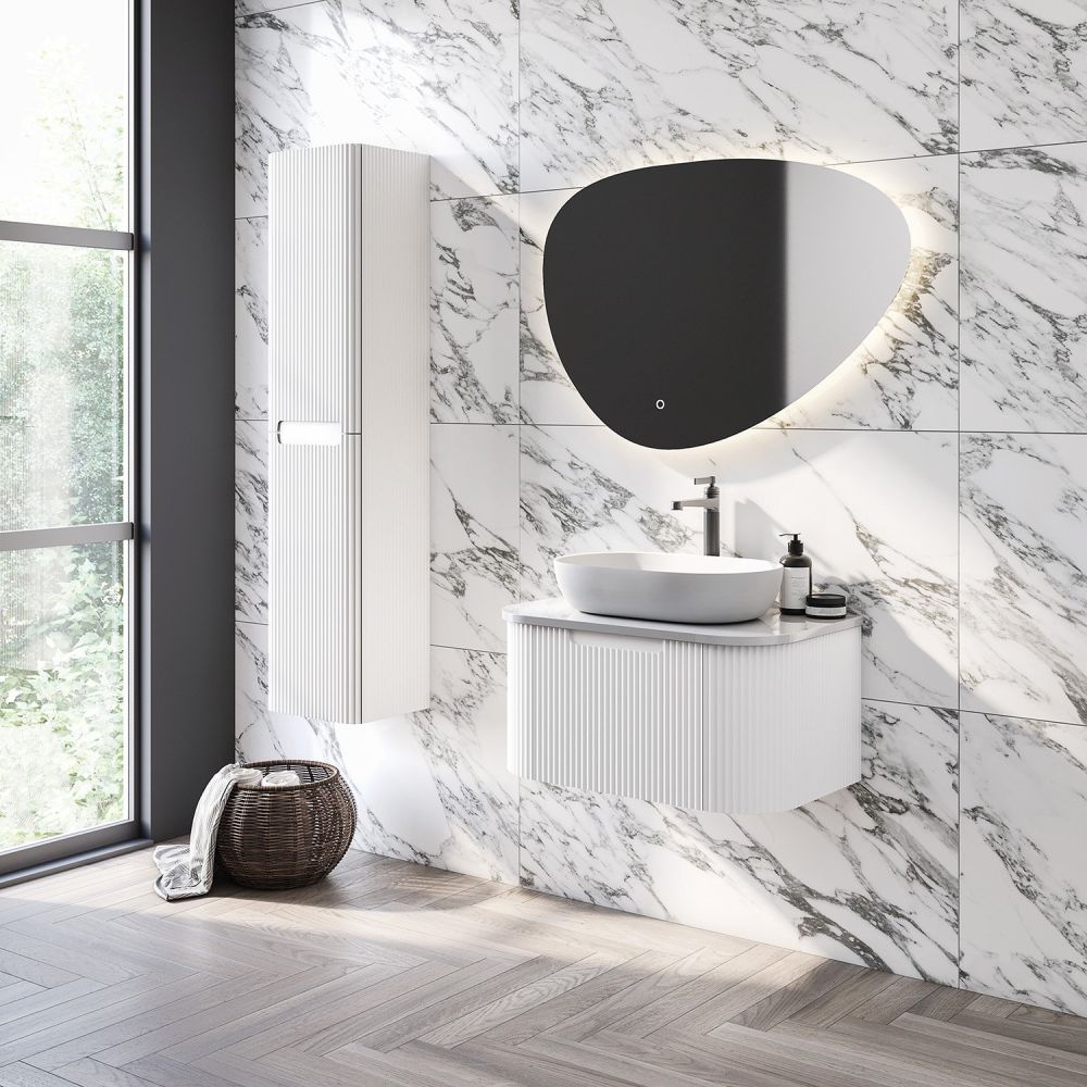 White marble roomset showcasing the Soar Ribbed White Wall Mounted Tall Storage Cabinet 2