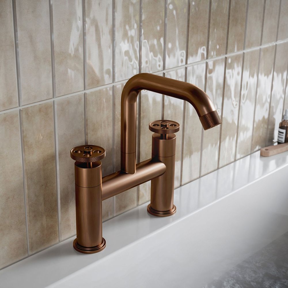Industrial styled bathrom image showcasing the Urban Brushed Bronze Bath Filler Tap