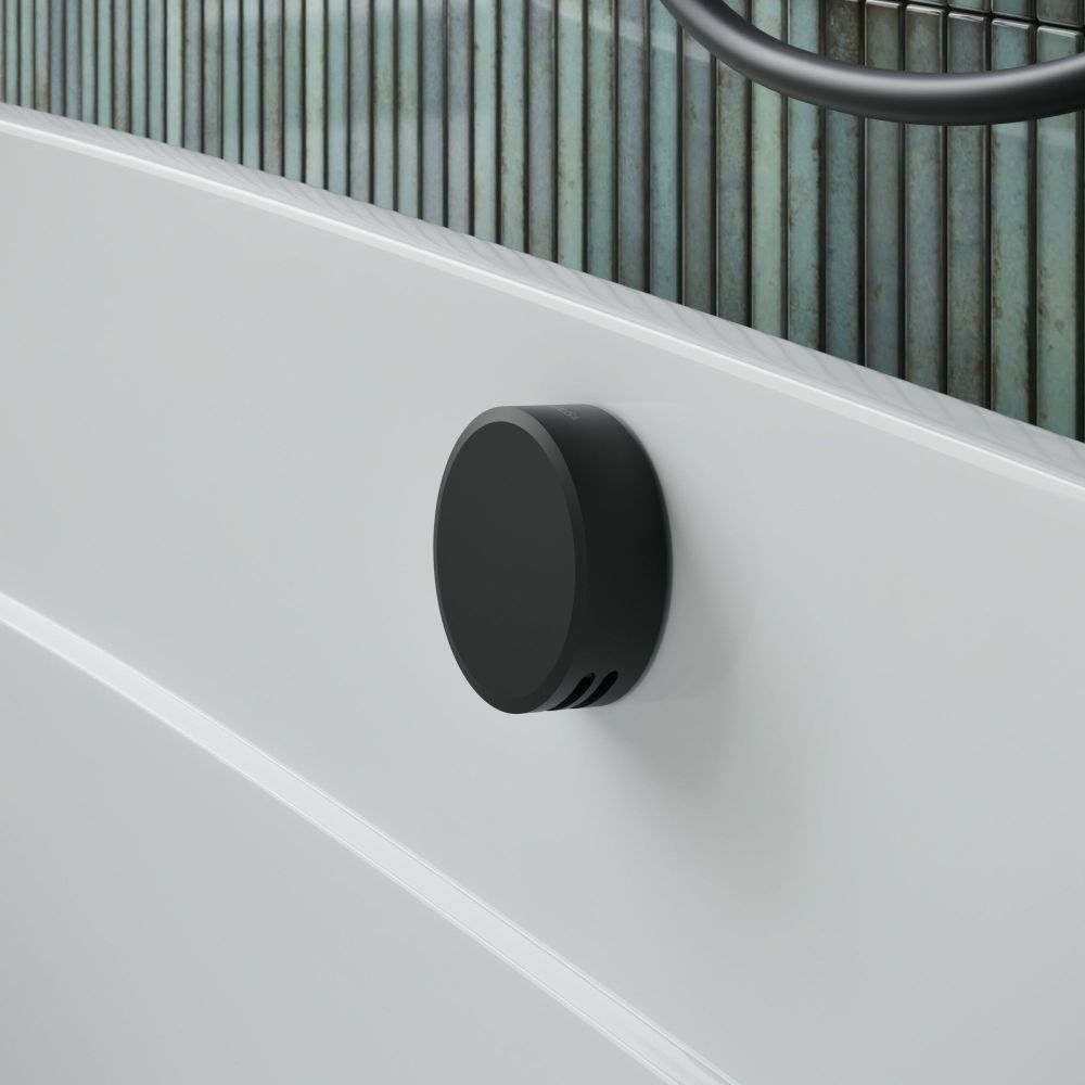 Aqualisa S3 black bath filler with teal tiled background