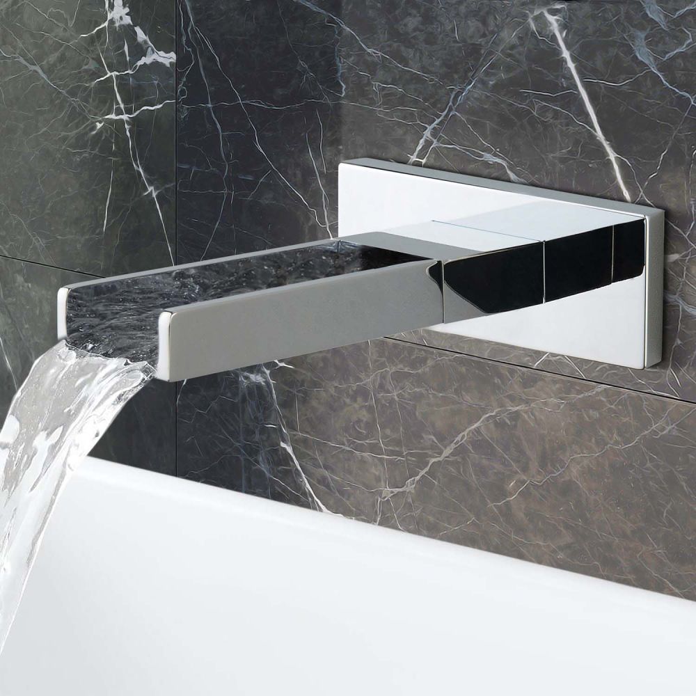 Lifestyle image showing the Vade Chrome Wall Mounted Waterfall Bath Spout running