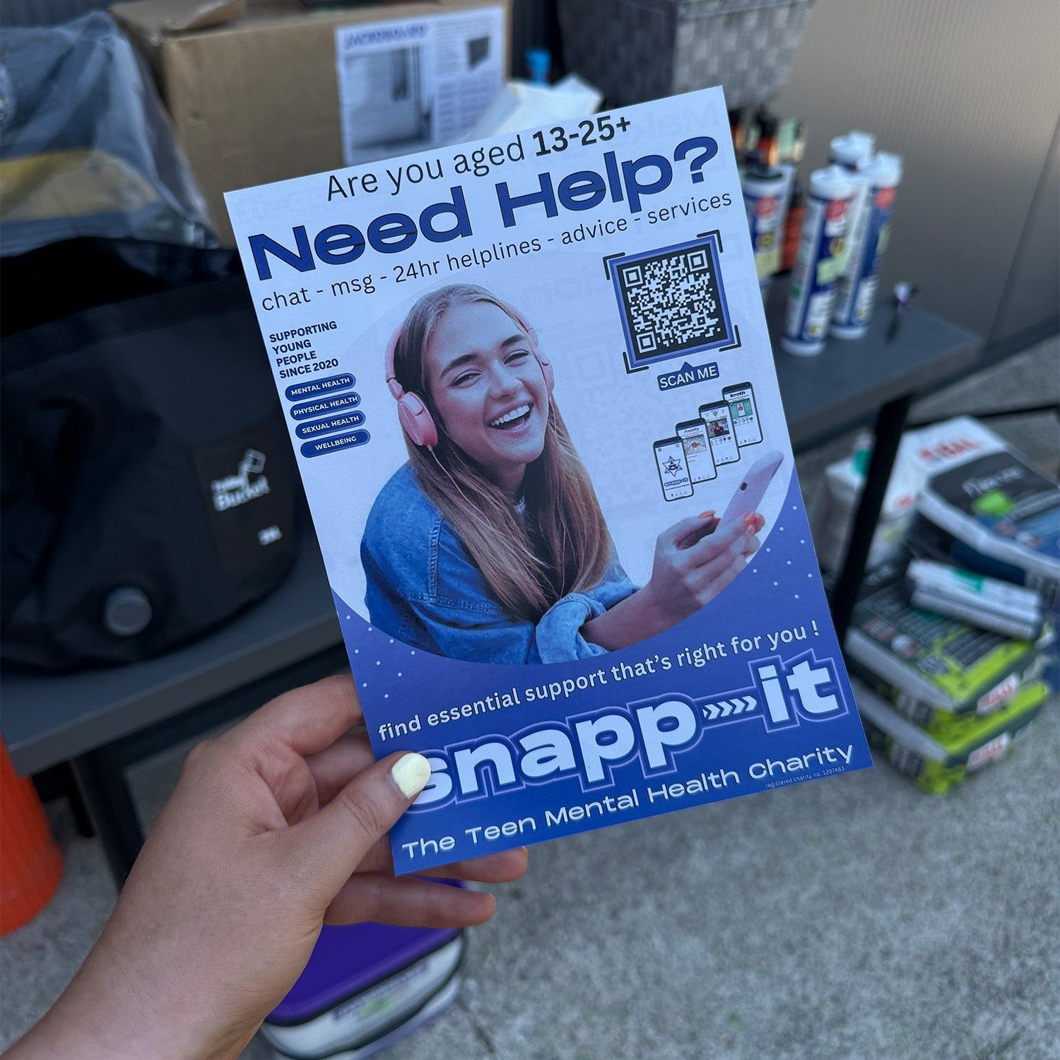 Snapp-It charity leaflet promoting support services for young people at the Chesterfield trade event