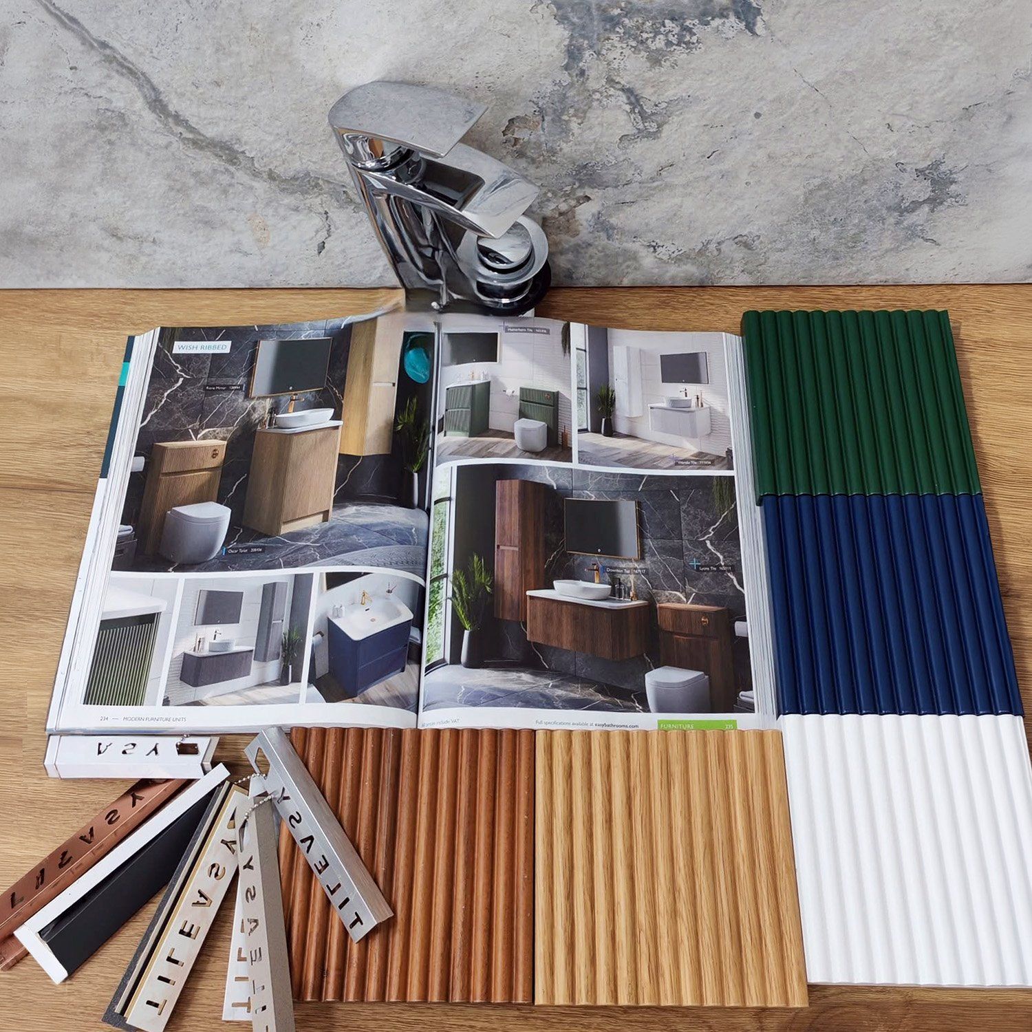 Bathroom mood board featuring the Wish Ribbed furniture range, chrome tap, stone-effect tile and fluted colour samples in wood, green, blue and white finishes.