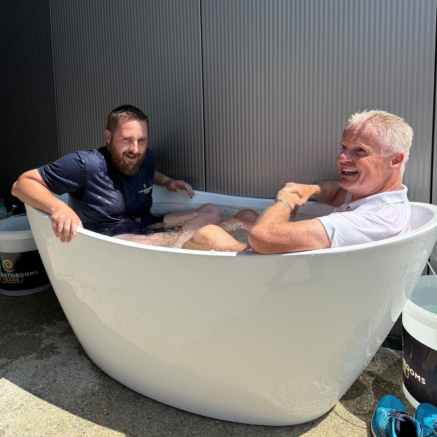 Rich and a member of the BEWI team in the charity ice bath raising money for Snapp-It.