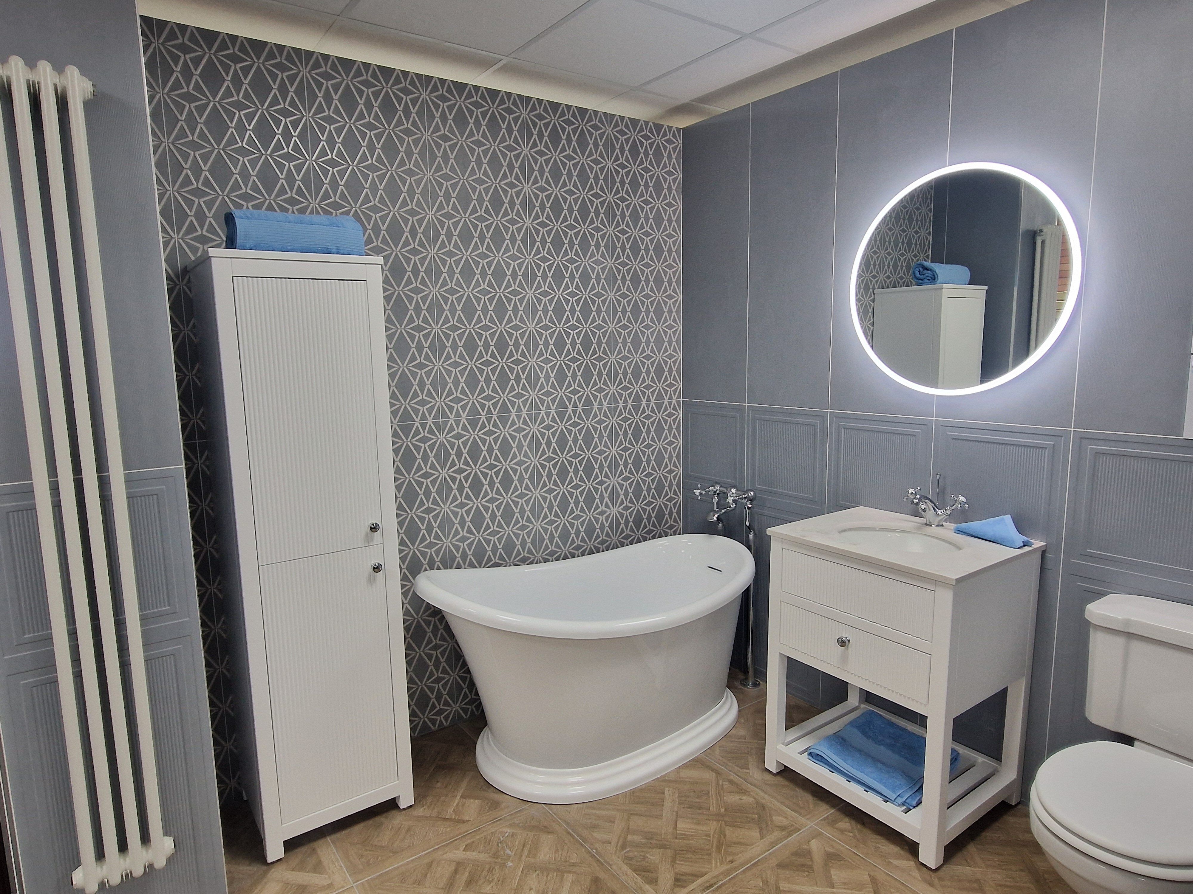 Geometric Huntsman Tiles in warm grey, paired with warming grey bathroom furniture