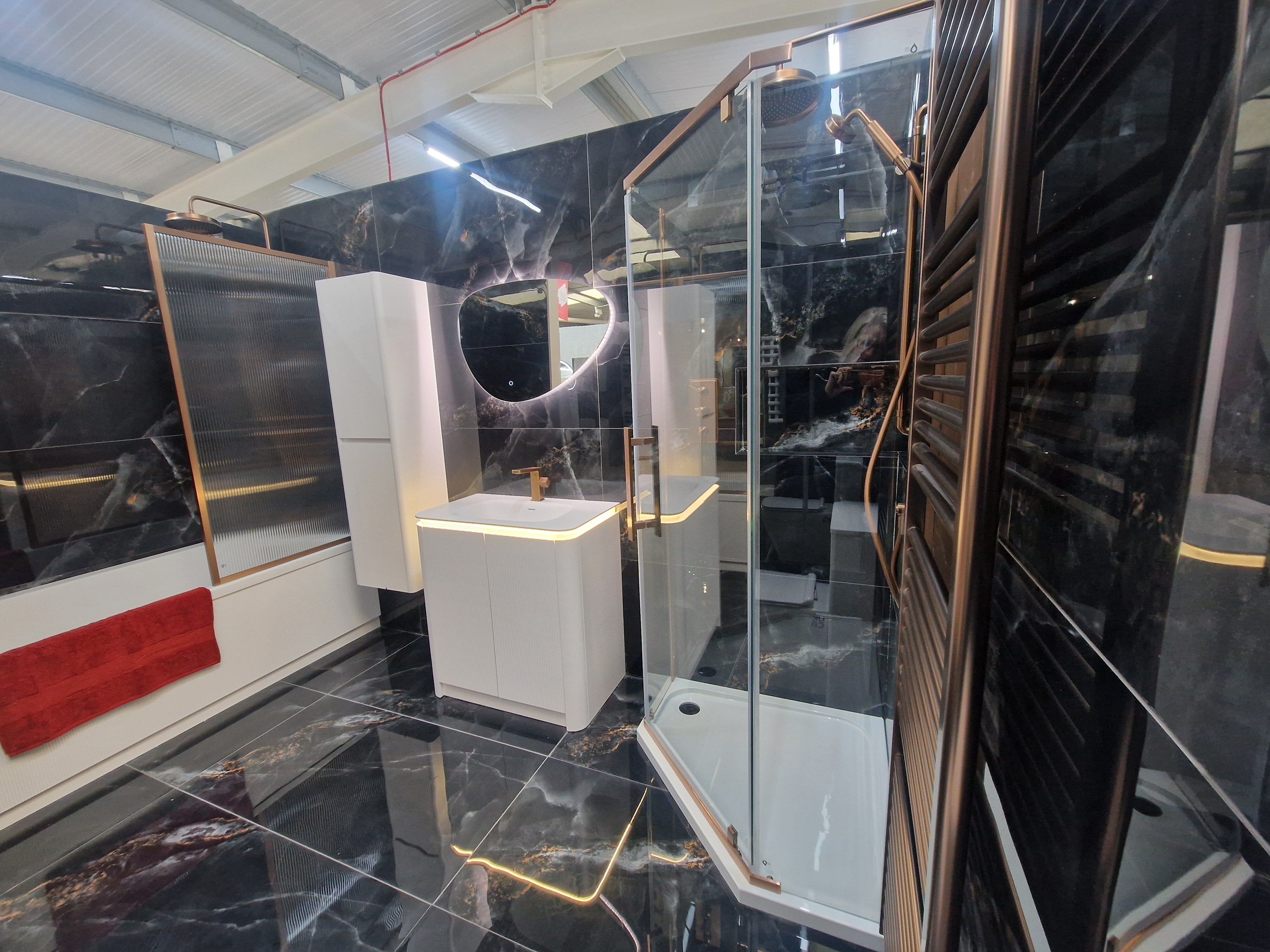 Black Nebula Tiles used on floor and walls in a contemporary bathroom display at Easy Bathrooms Cirencester