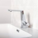 Lifestyle image in a fresh neutral bathroom showing the Cacia Chrome Basin Mixer Tap & Waste