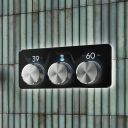 Aqualisa S3 chrome Horizontal Controls detailed view upon a teal tiled background