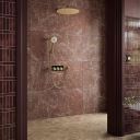 Aqualisa S3 Gold Digital Shower Dual Outlet (Slide Rail Kit with Fixed Wall Head) HP/Combi Displayed in a modern roomset with stone brown tiles