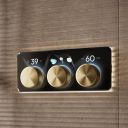 Aqualisa S3 Gold Horizontal Controls detailed view upon a brown tiled background