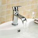 Lifestyle image showing the Harlow Chrome Basin Mixer Tap & Waste running