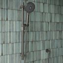 Aqualisa S3 gunmetal slide rail kit on an aqua tiled background