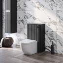 white marble roomset showcasing the Soar Ribbed Black WC Unit