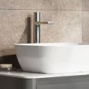 Lifestyle image in a warm setting showing the Pancho Chrome Tall Basin Mixer Tap