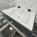 Contemporary bathroom setting showcasing the Carron Celsius Duo Double Ended Carronite Bath 2000x1400mm