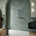 Aqualisa S3 Matt Black Shower Pack on a aqua tiled background