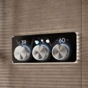 Aqualisa S3 chrome Horizontal Controls detailed view upon a brown tiled background