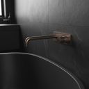 Moray Satin Bronze single lever bath mixer tap featuring a textured knurled detailing - Roomset