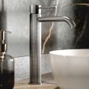 Moray Brushed Nickel tall basin mixer tap featuring a textured knurled detailing - Roomset