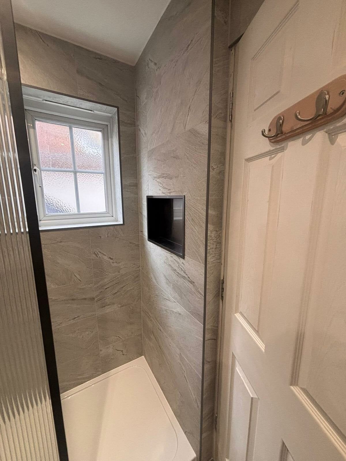 Marble effect gloss porcelain tiles from Easy Bathrooms & Tiles Bedford