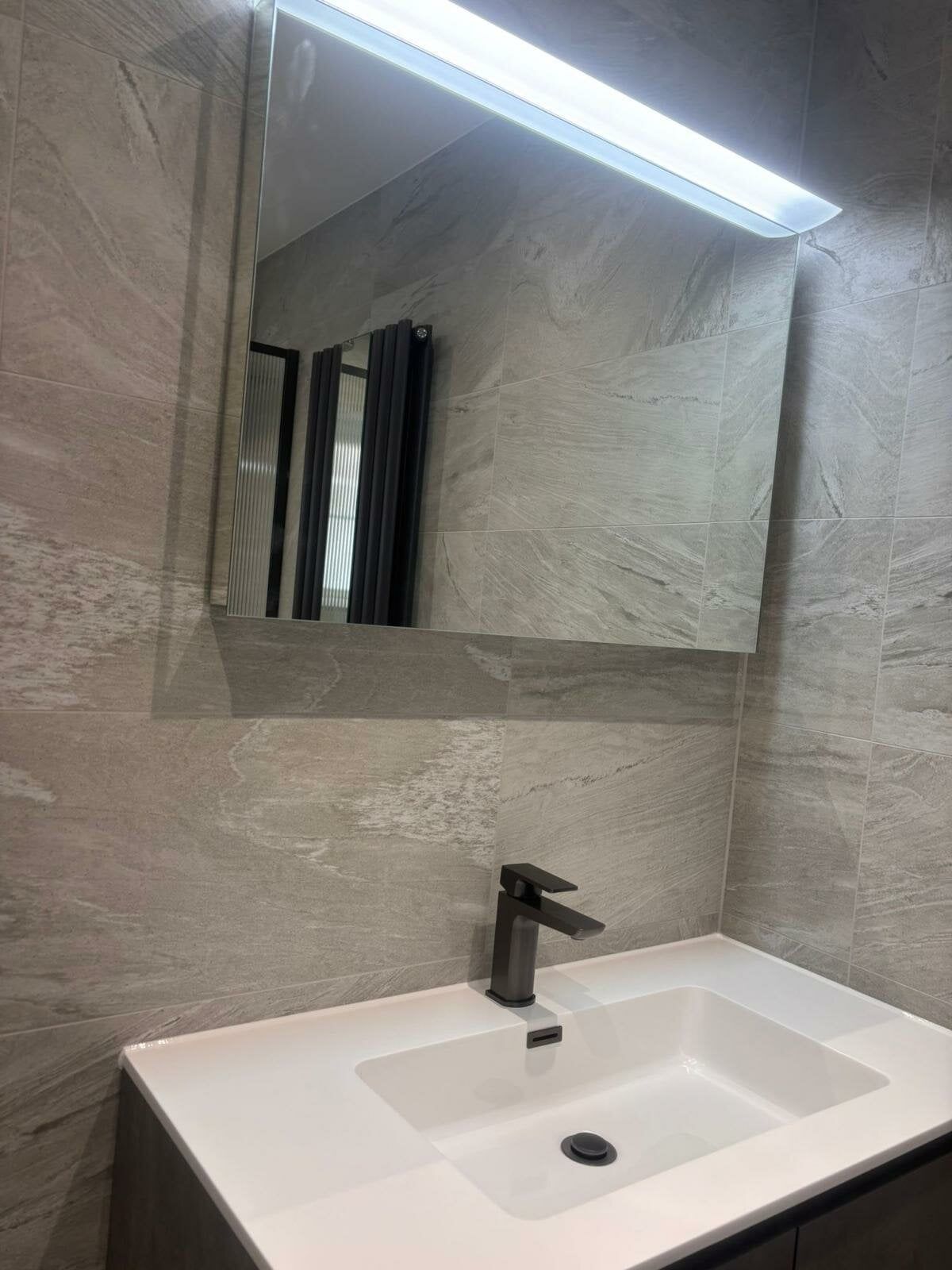 Vanity, basin and LED mirror from Easy Bathrooms & Tiles Bedford
