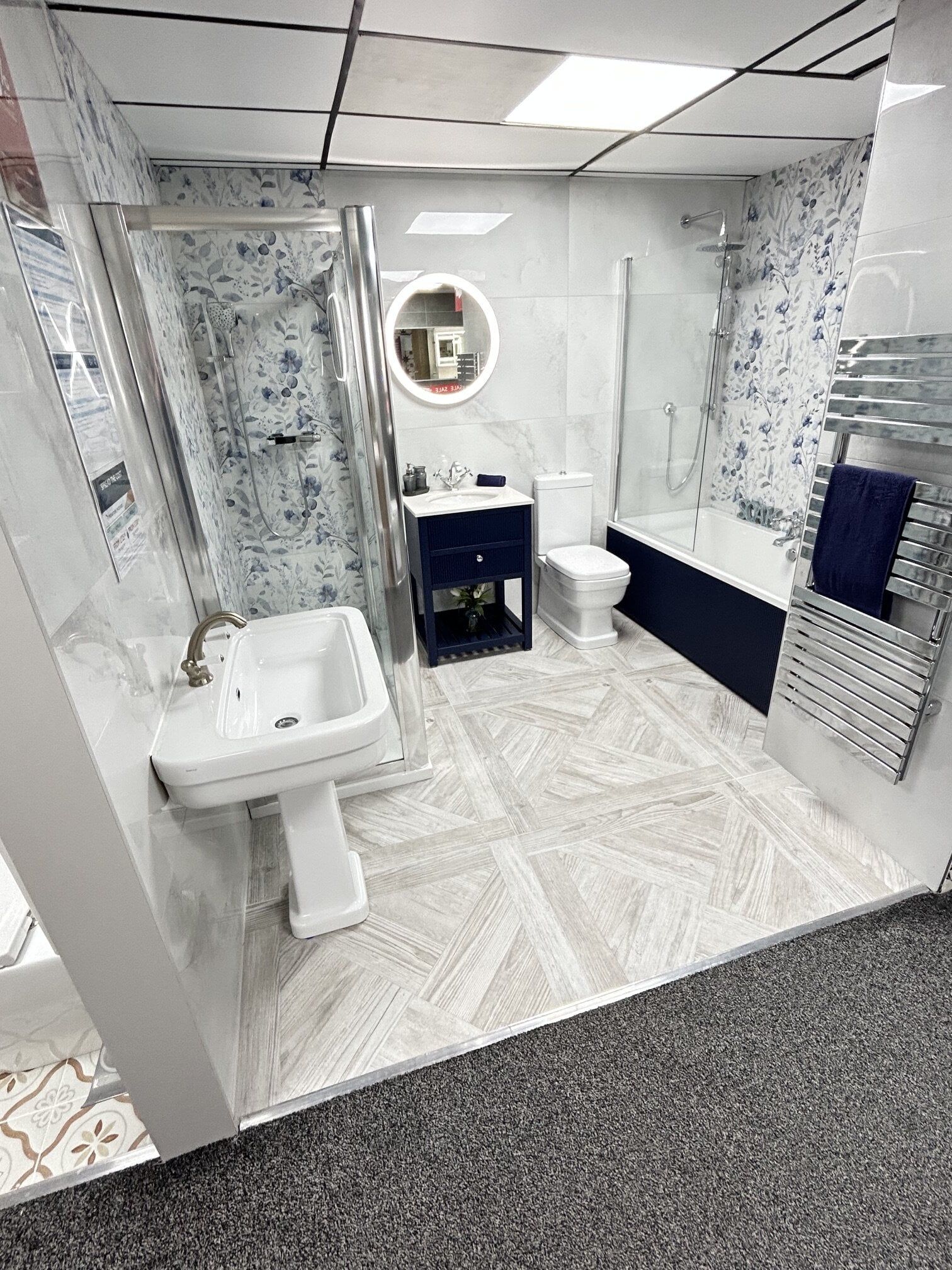 traditional style bathroom display featuring sakura blue floral tiles
