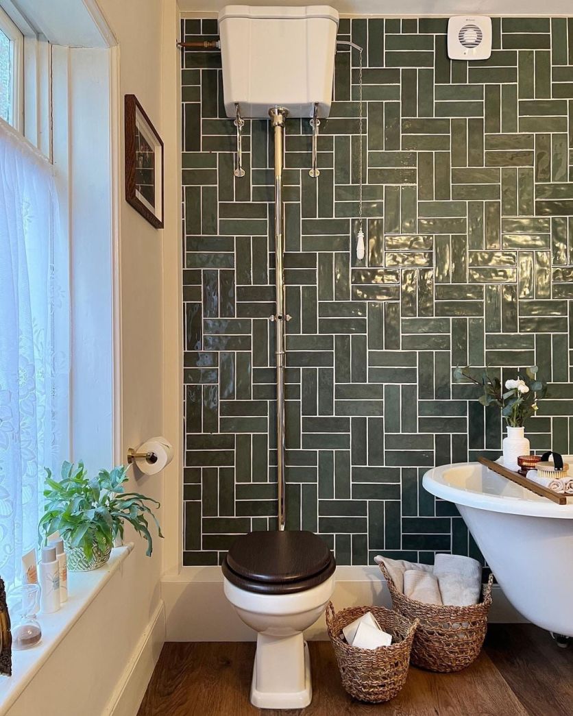 green brick tiles in traditional bathroom with wooden floor