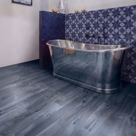 Bathroom floor in discontinued Clearance Tiles Myst Azul Blue Gloss Wood Effect Porcelain Tile.
