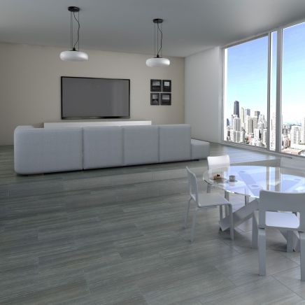 Open-plan living room floor tiled in Espada Carbon Matt Porcelain Tiles 300x600mm.   
