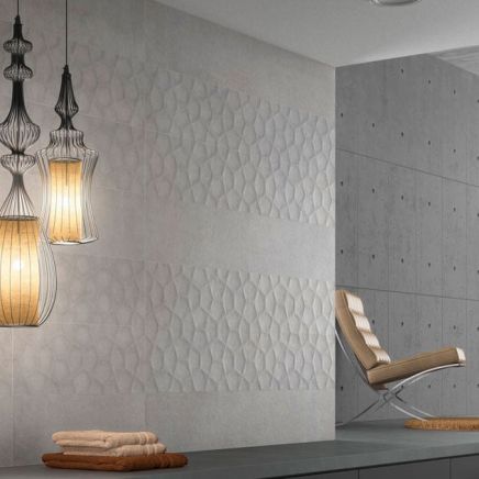 Flat swatch view of the Kenya Arkan Blanco Ceramic Tile showing 3D geometric polygonal relief.