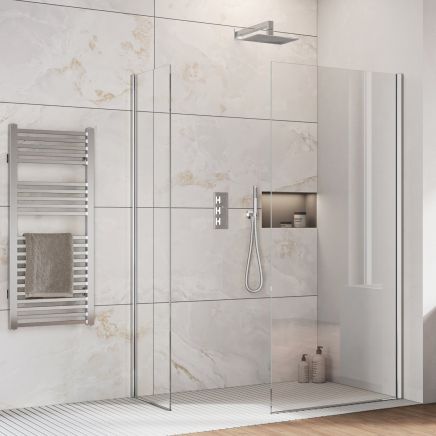 Oxford Chrome Walk-In Wetroom Shower Screen with clear glass panels and chrome trim profile in a modern marble effect tiled bathroom.