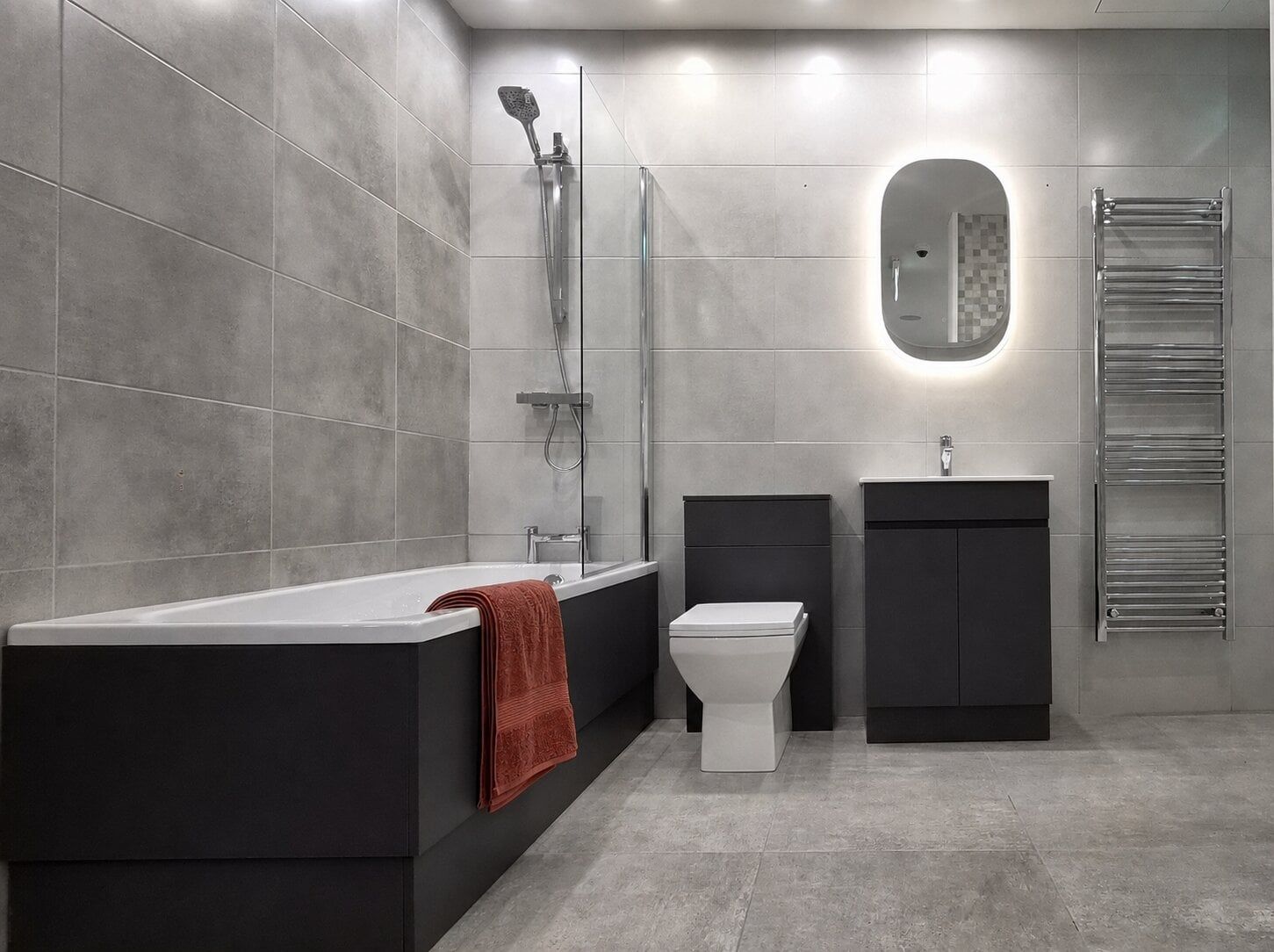 New Trade Only bathroom display at the Easy Bathrooms Glasgow showroom featuring modern furniture, mirror, tiles and trade products.