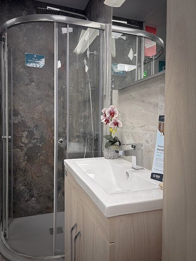 Showroom display featuring bathroom wall PVC panels