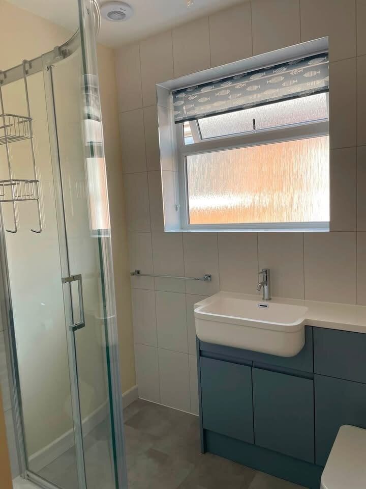 Accessible bathroom created by Easy Bathrooms Norwich with accessible shower enclosure