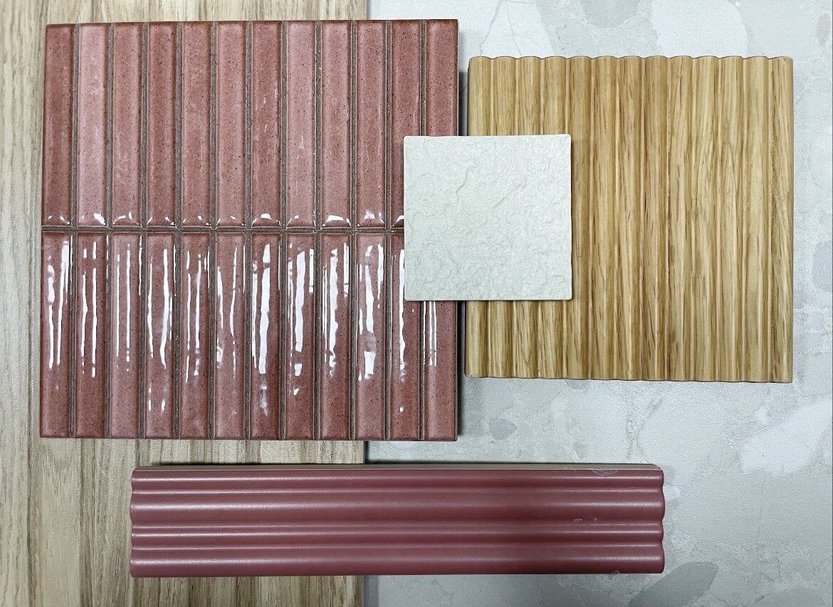 Bathroom mood board featuring natural oak finishes, glossy rose tiles and coordinating neutral samples.