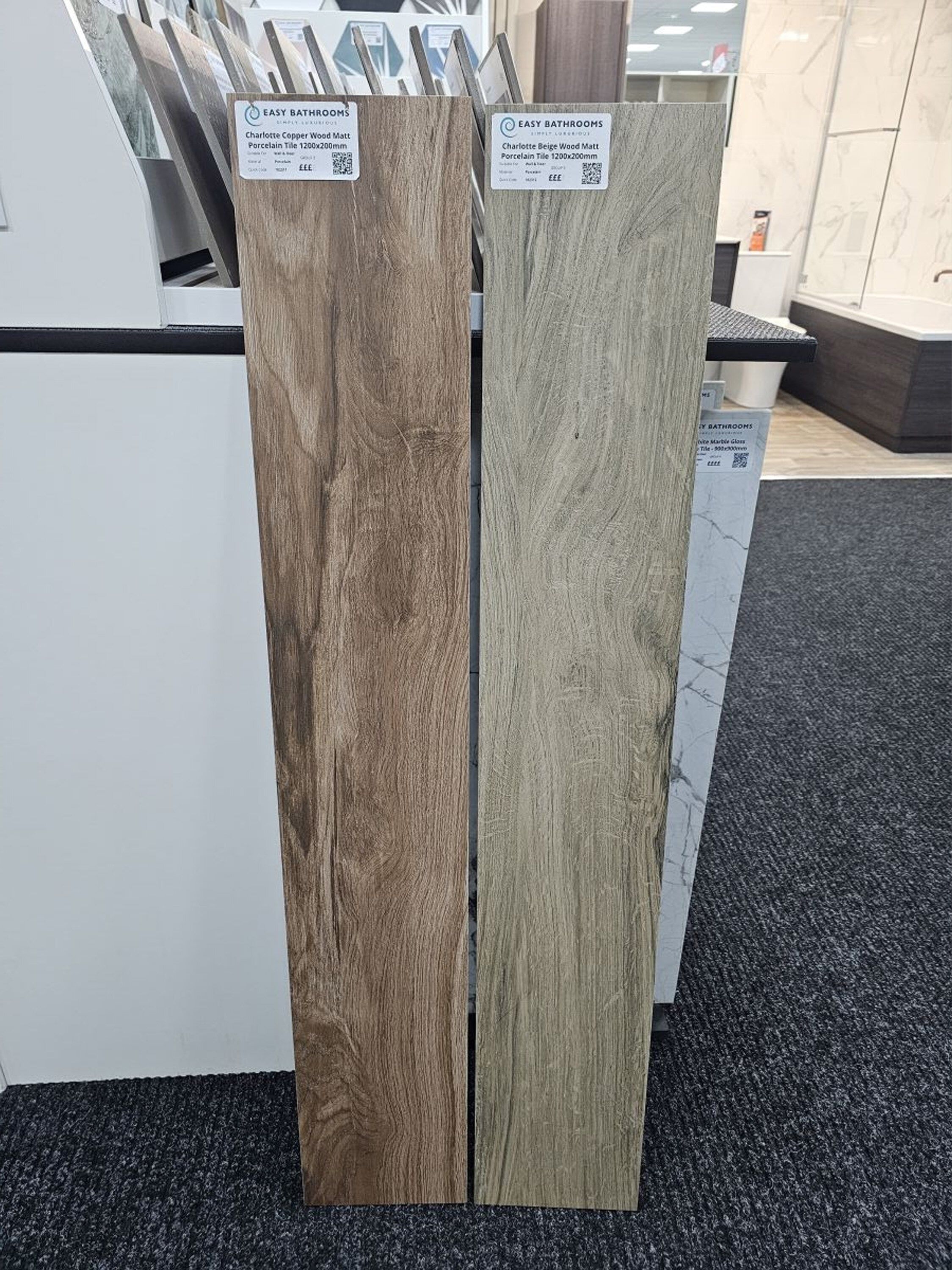 Wood-effect porcelain tile samples in light and medium natural finishes.